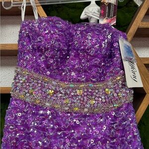 Tiffany Silver gown.